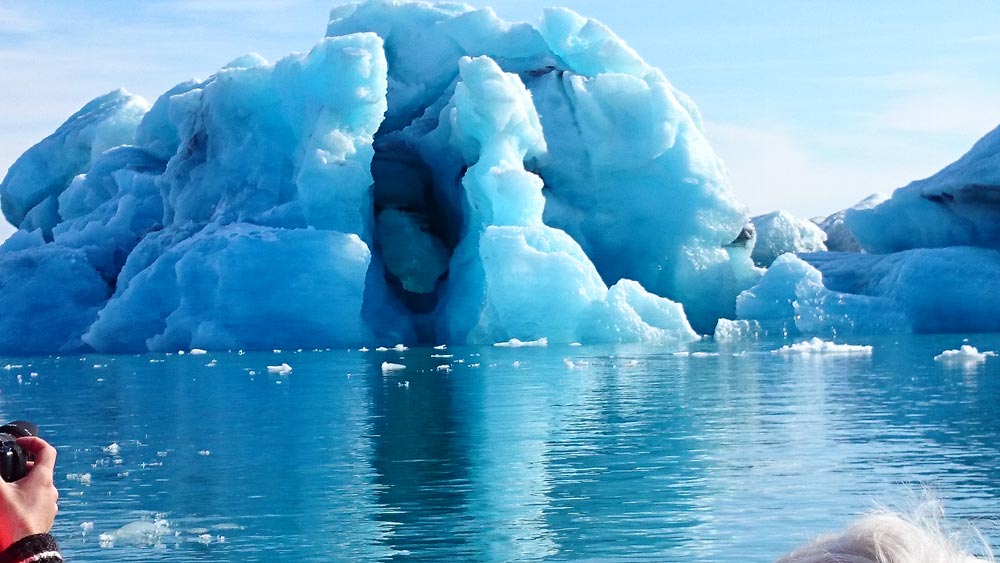 Iceberg floating Jokulsarlon Glacier lagoon blue-ice sunny day