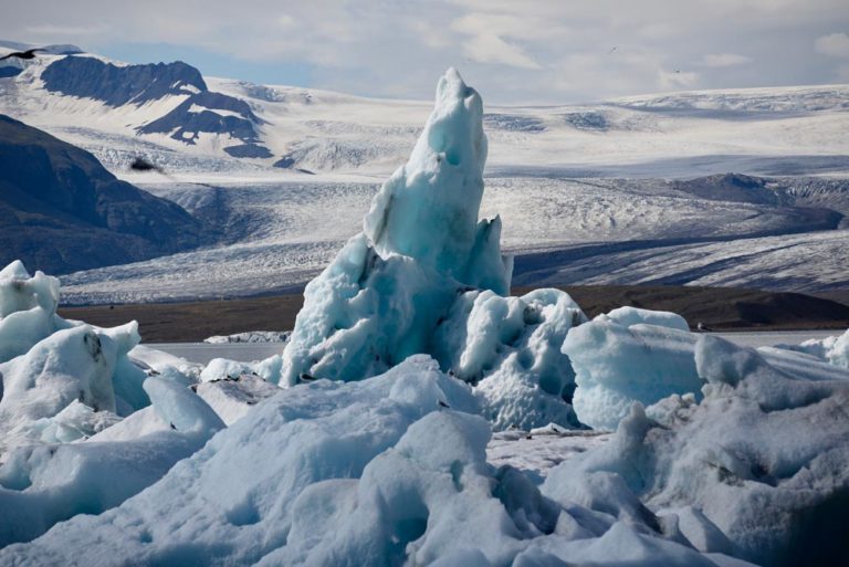 Icebergs floating on Jokulsarlon Glacier lagoon blue ice