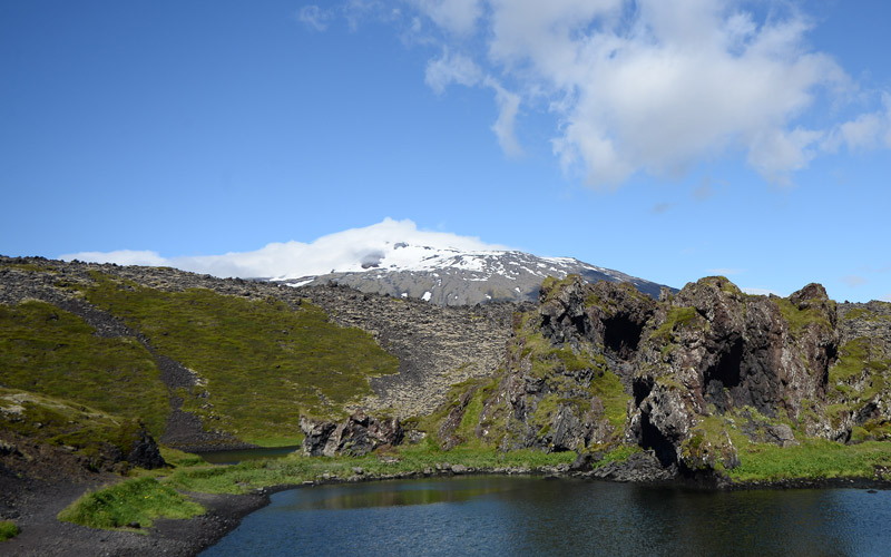 Snaefelsjokull glacier moss covered lava fileds blue sky volcano lake
